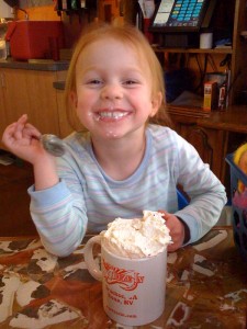 Young girl enjoys hot coco at Squeeze In during family vacation in Lake Tahoe