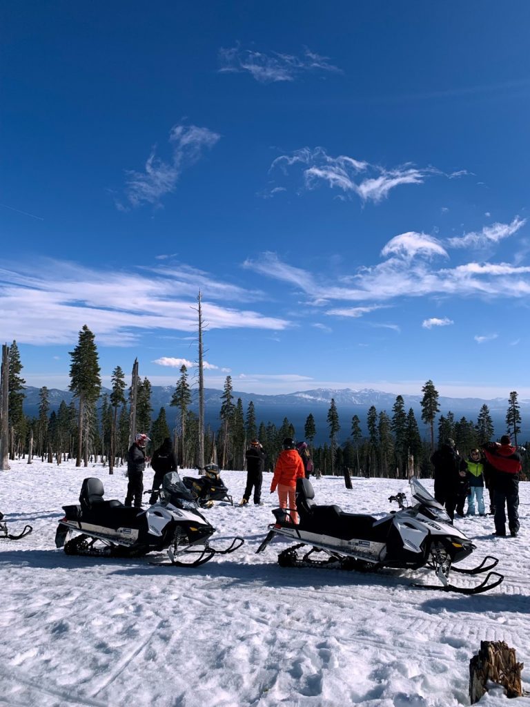 Group of people getting ready to snowmobile in lake tahoe