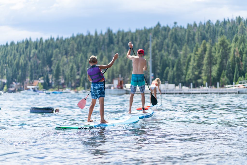 Two people paddle boarding in North Lake Tahoe