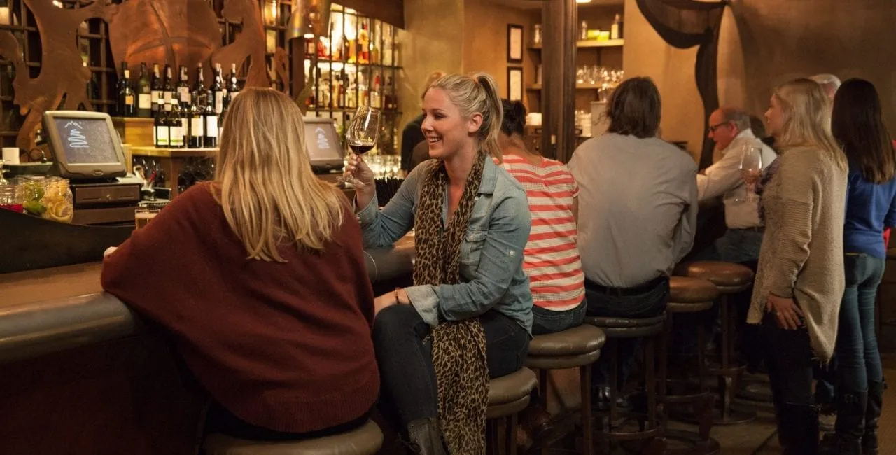 Plumpjack bar during a busy happy hour