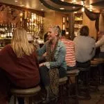 Plumpjack bar during a busy happy hour