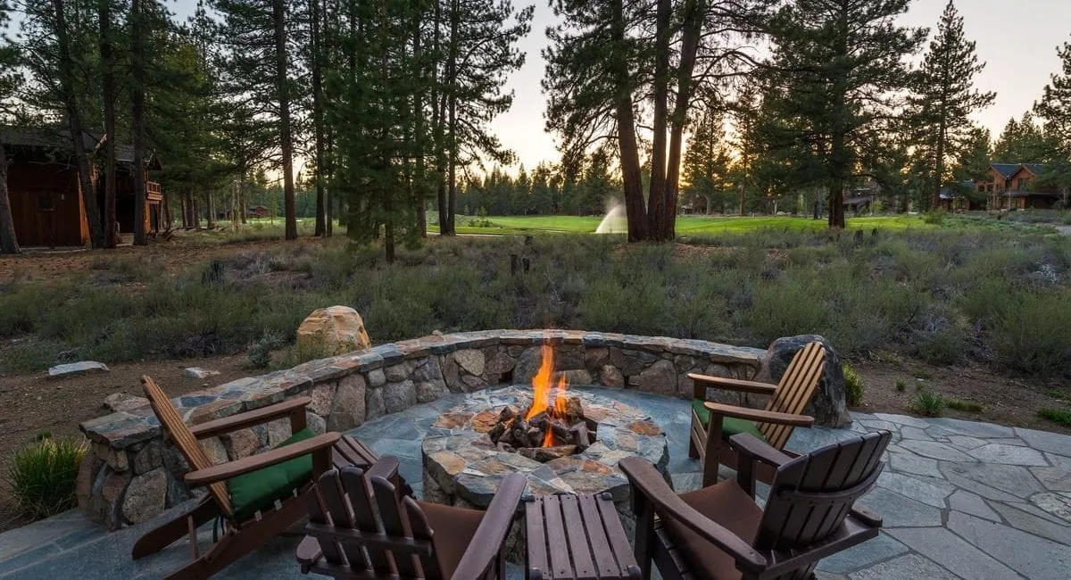 Fire pit outside next to trees in Lake Tahoe