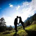 Couple kissing at viewpoint photo by Chris Werner