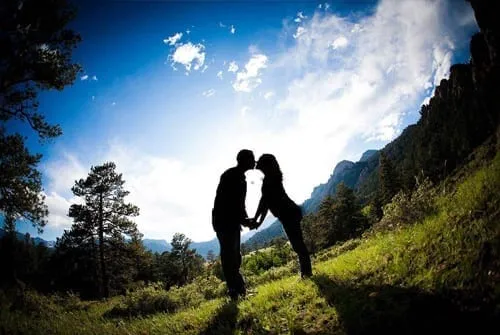Couple kissing at viewpoint photo by Chris Werner