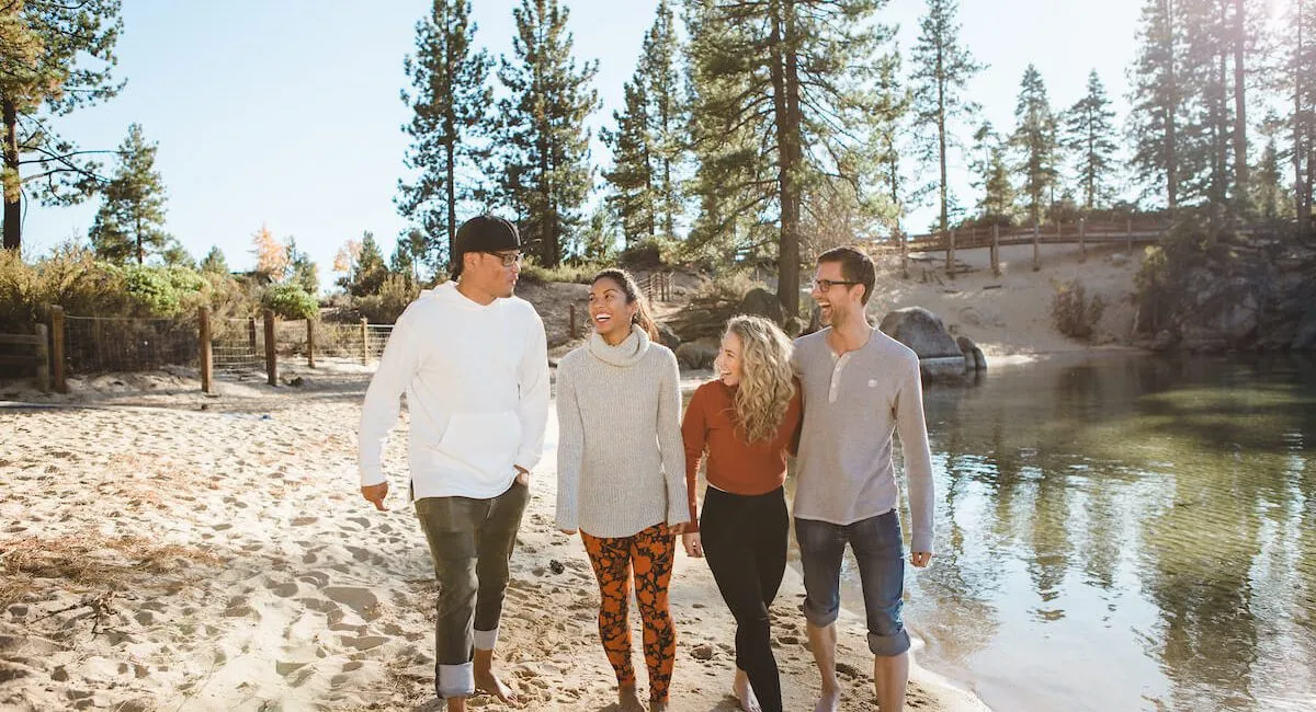 Friends walking beach at Sand Harbor in Lake Tahoe