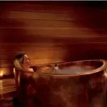 Woman in a luxurious bath tub in lake Tahoe