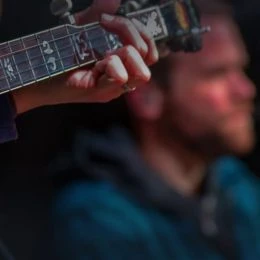 Musicians on stage performing for a Lake Tahoe crowd