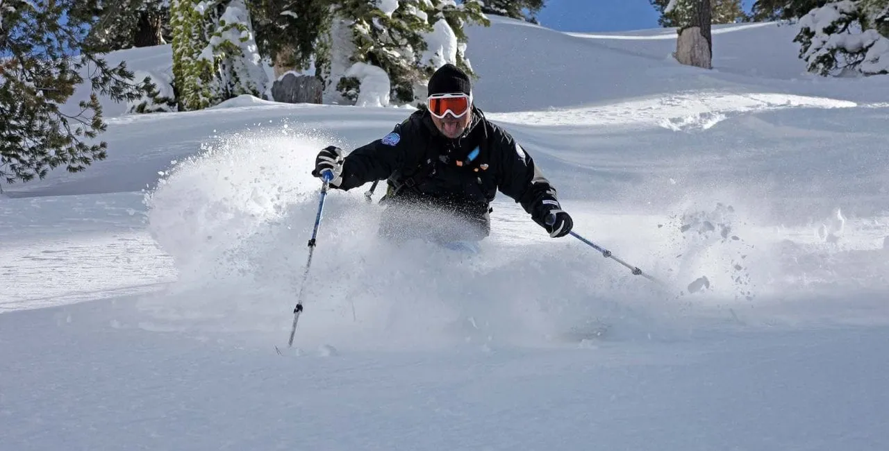 Person skiing in Lake Tahoe in some powder