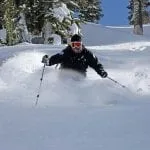 Person skiing in Lake Tahoe in some powder