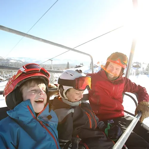 Family on a ski lift in Tahoe Donner