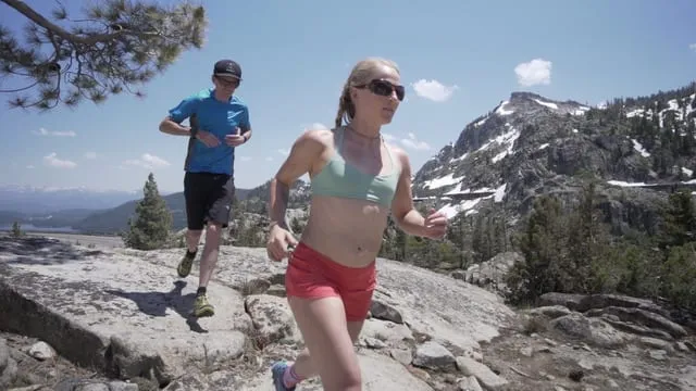 People trail running in Lake Tahoe