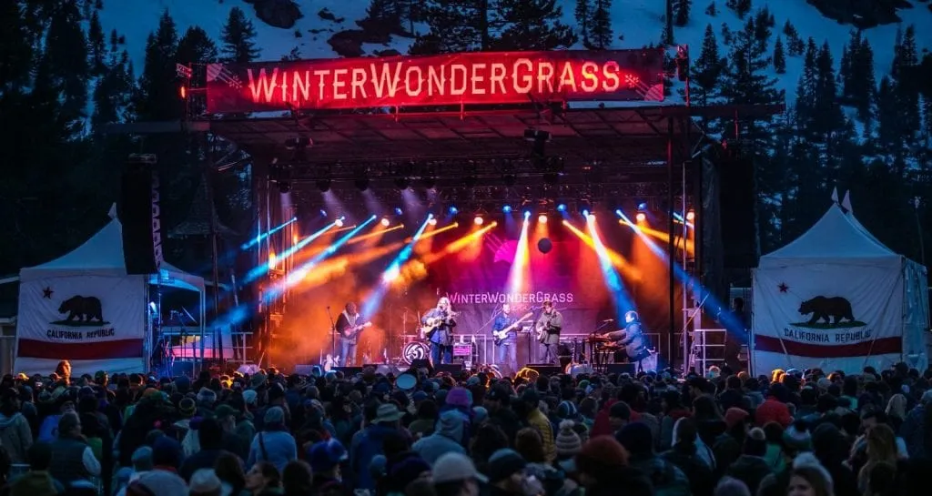 WinterWonderGrass stage at night with a band performing