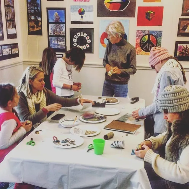 Women and kids making art in lake Tahoe