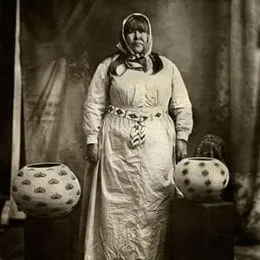 Old timey photo of a lady in a dress