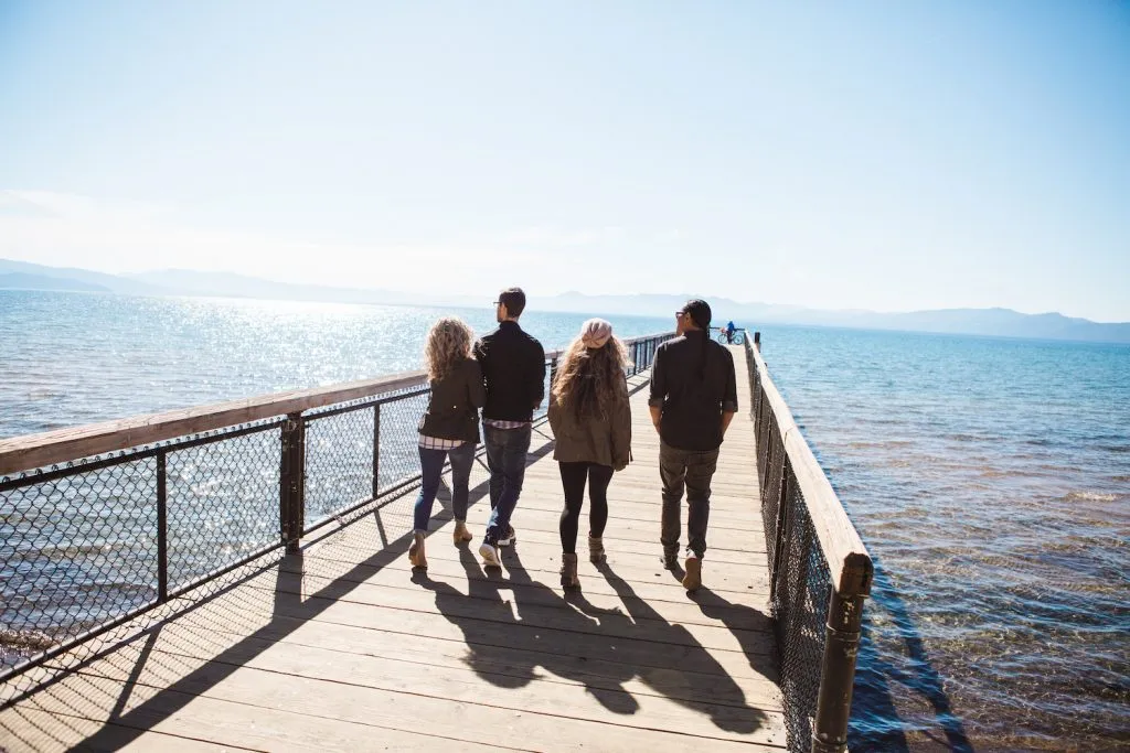 Family walking on a pier in Lake Tahoe