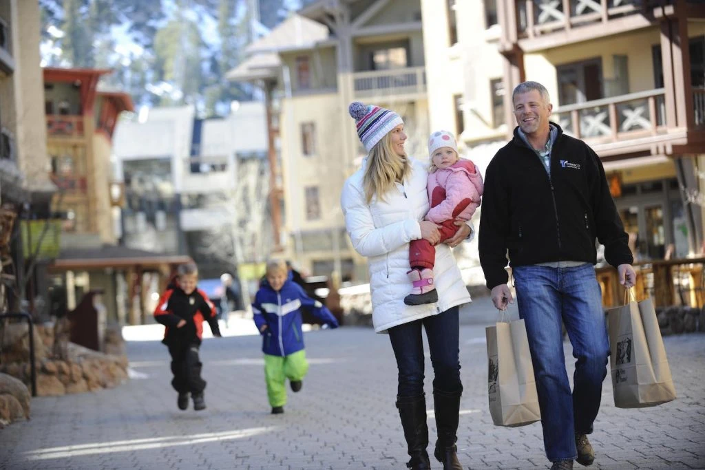 Couple shopping and carrying shopping bags in Lake Tahoe