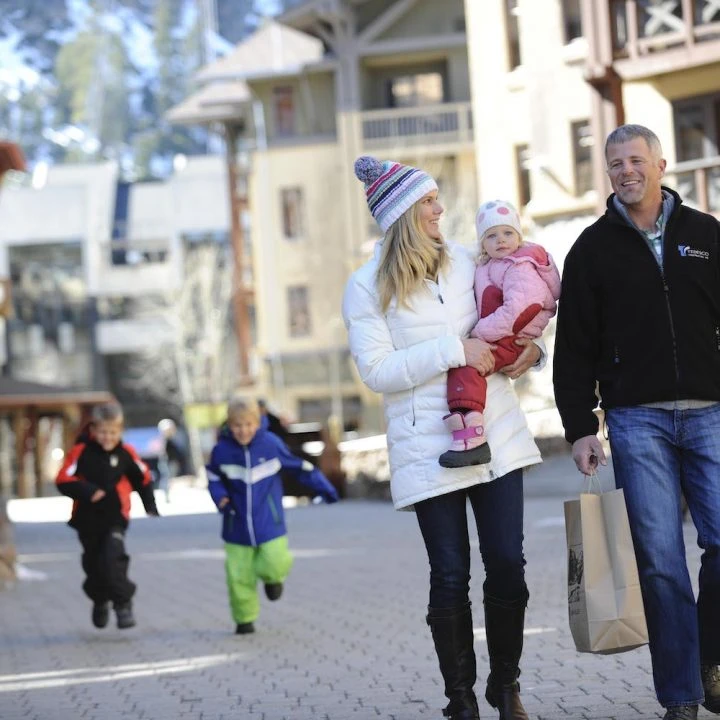 Couple shopping and carrying shopping bags in Lake Tahoe