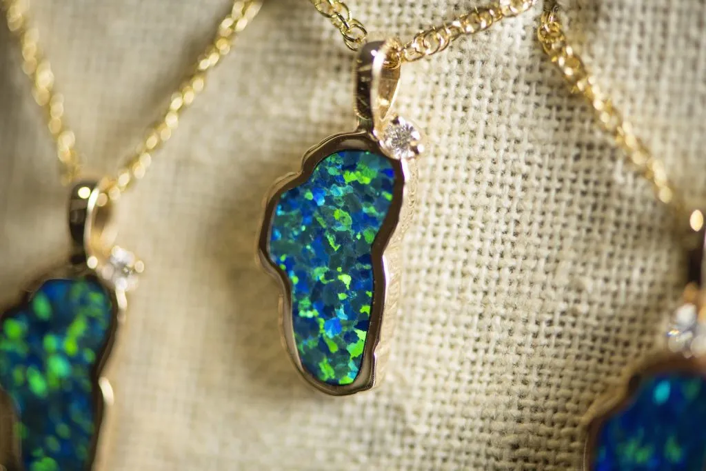 Piece of jewelry shaped like Lake Tahoe