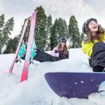 Kids having fun skiing and snowboarding on Ski Hill in Granlibakken Lake Tahoe