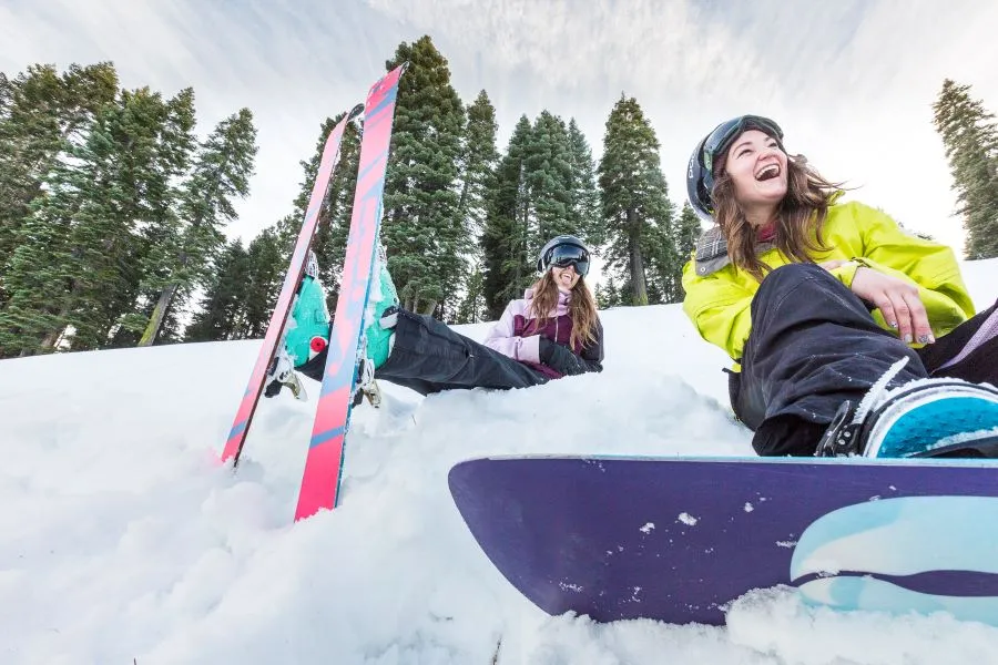 Kids having fun skiing and snowboarding on Ski Hill in Granlibakken Lake Tahoe