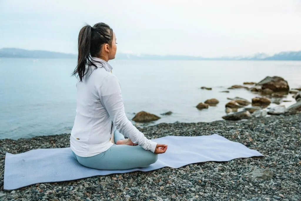 Woman on yoga mat in Lake Tahoe