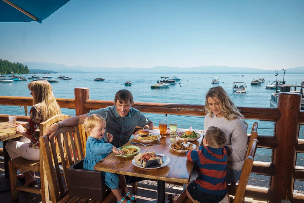 Family dining lakeside