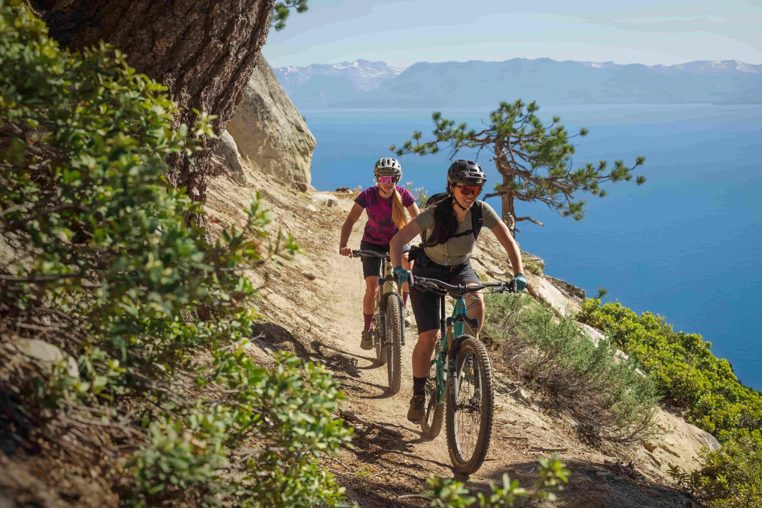 Mountain biking on a lakeside trail.
